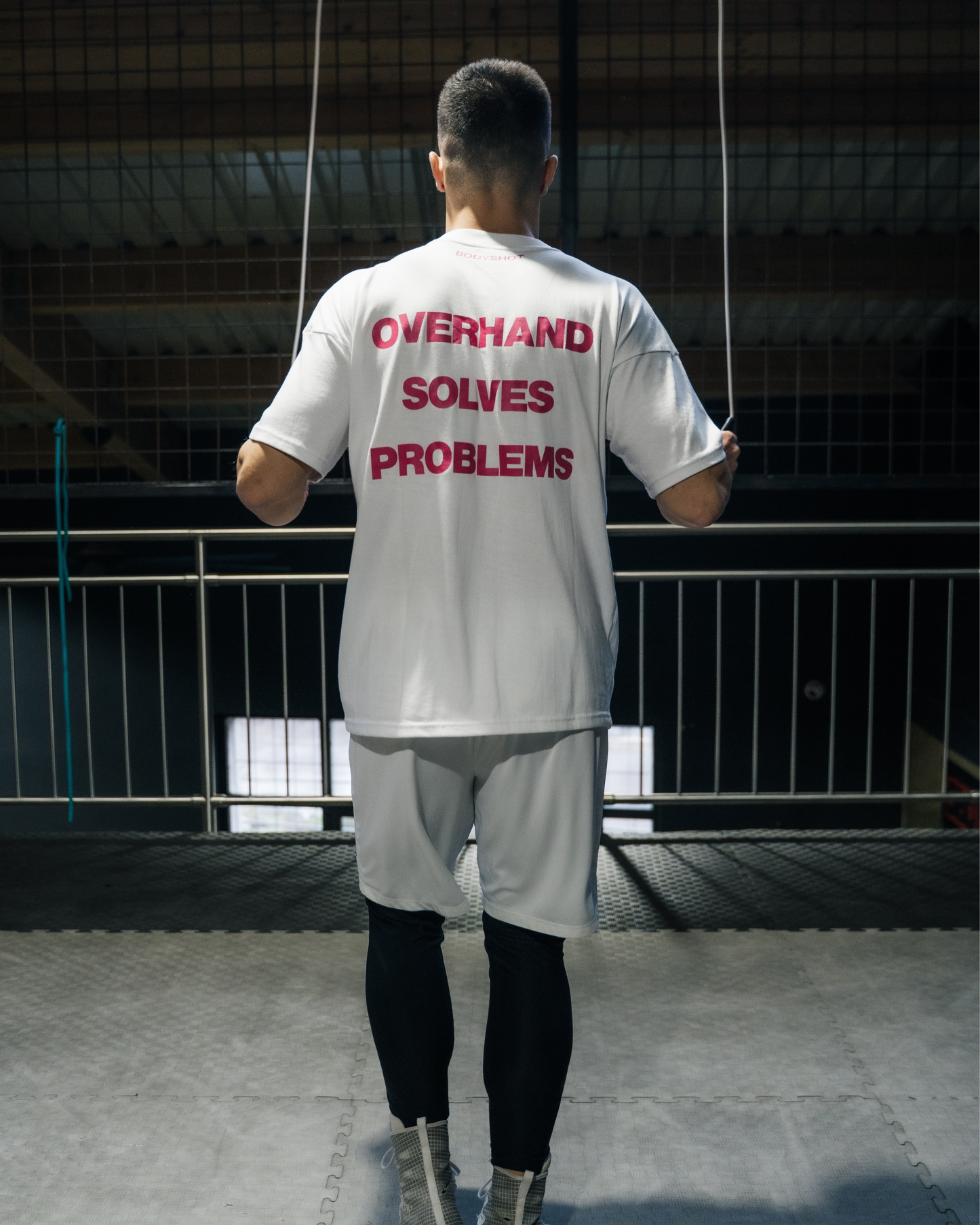 Overhand Solves Problems T-Shirt Pink/White