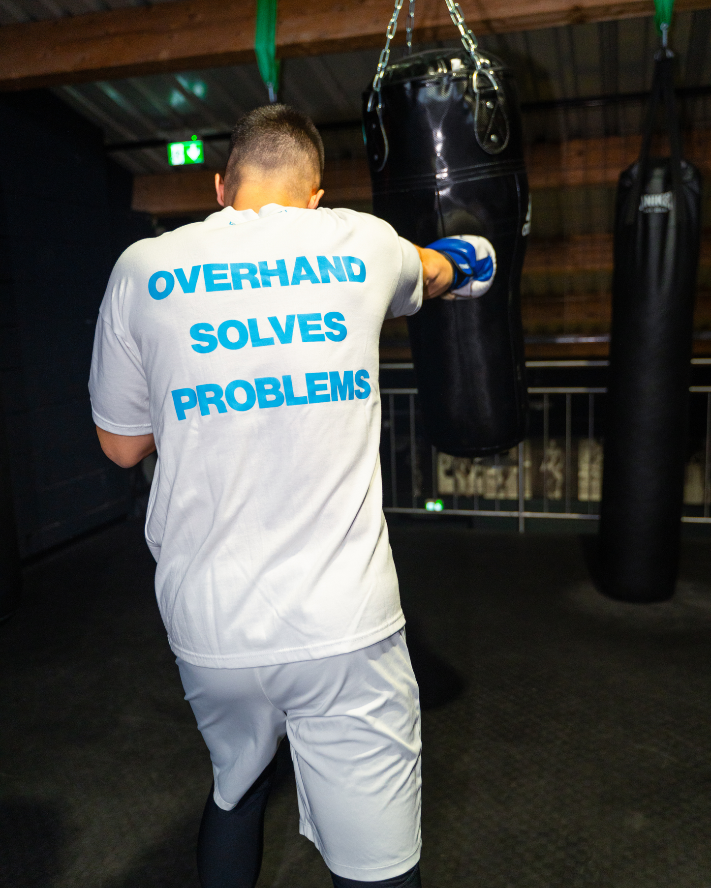 Overhand Solves Problems T-Shirt Babyblue/White